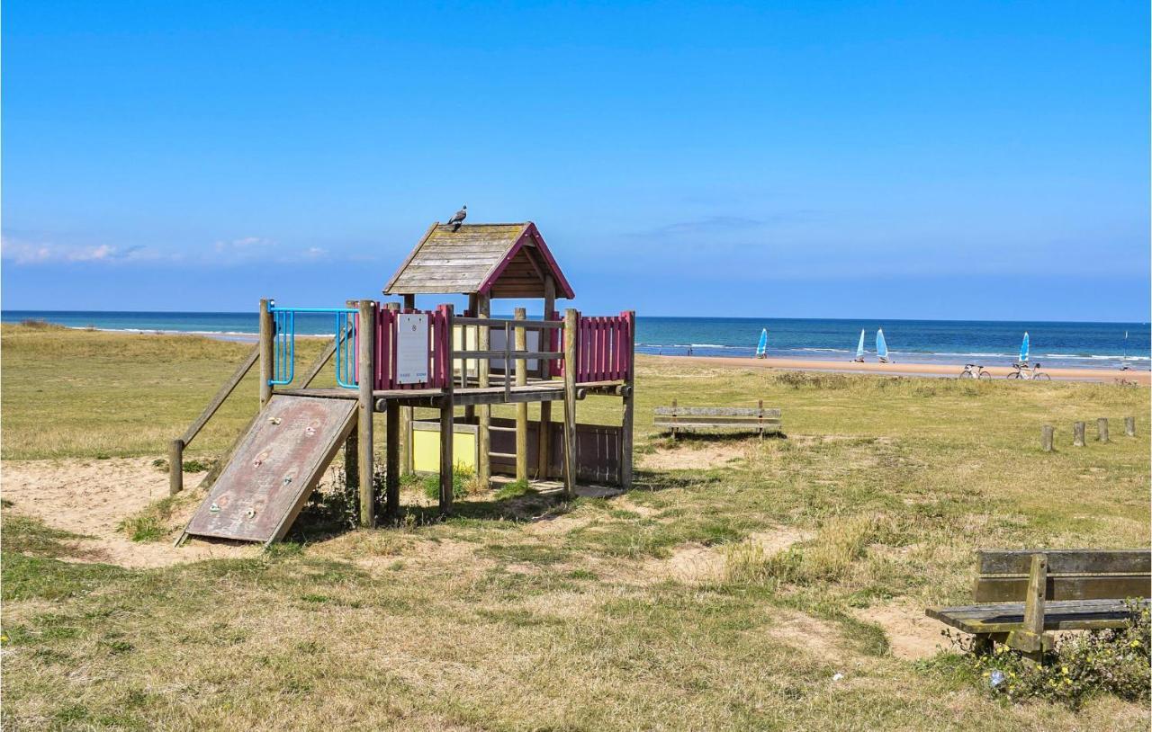 Holiday home 4 Bedroom Cozy In Port-en-bessin-huppain